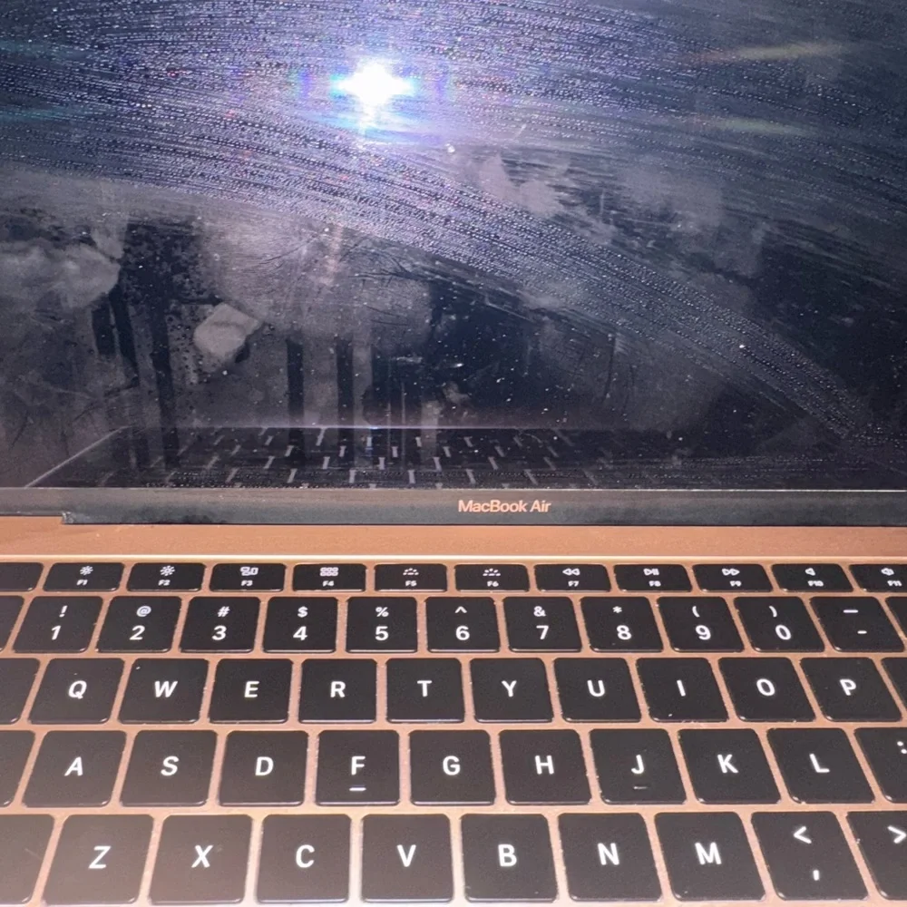 Apple Laptop - Gold and Black